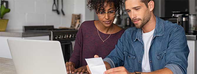 Couple looking at a computer